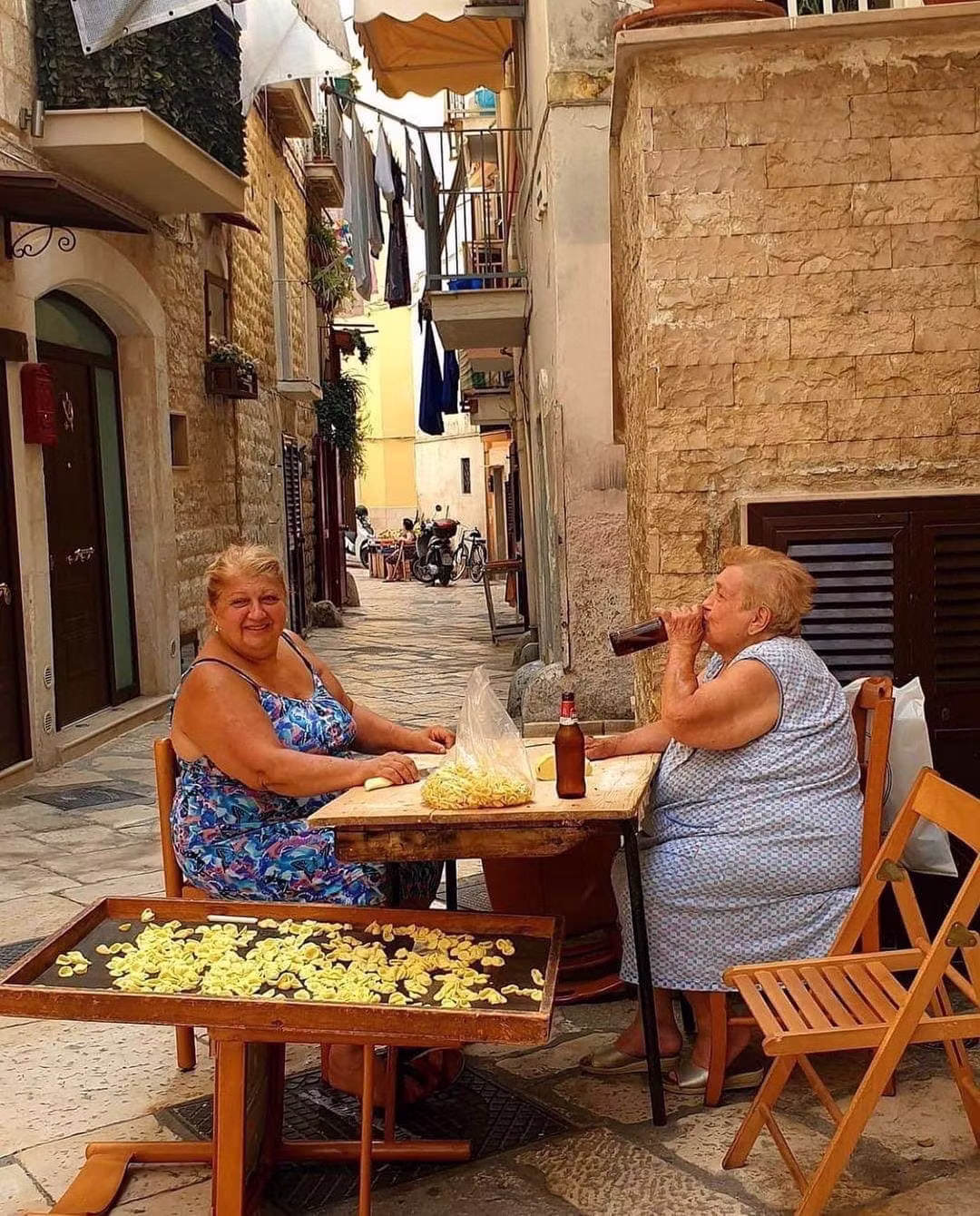 Traditional pasta making scene in Southern Italy